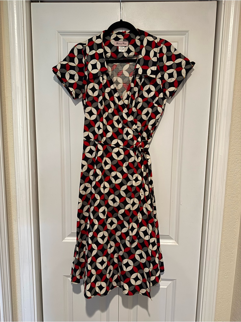 Vintage Inspired Wrap Dress with Bold Geometric Pattern